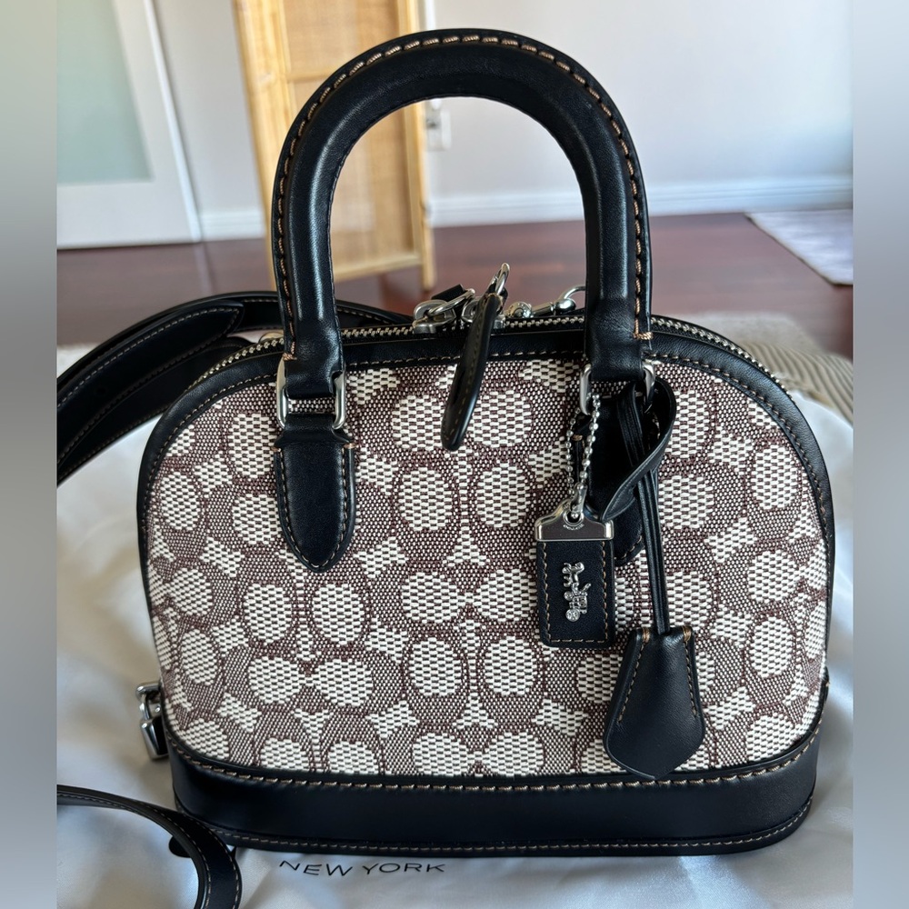 Coach revel 24 bag with original strap, dust bag.